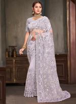 Net Lavender Wedding Wear Sequins Work Saree